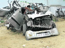 The mangled remains of a WagonR after an accident near Kurukshetra on Tuesday. 
