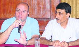 Spanish cardiac expert Dr Diaz and Dr Raman Chawla deliberate on advantages of angio sculpt balloon device in Jalandhar on Tuesday. 