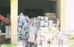 Bundles of books lying outside the regional book depot of Punjab School Education Board in Ludhiana. Photo: Inderjeet Verma