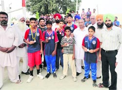 Pugilists of the Shere Punjab Sports Academy with the medals they won at the 28th Sub-Junior State Boxing Championship held in Jalandhar recently. Photo by writer