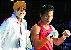 Devendro Singh with Indian coach Gurbax Singh Sandhu