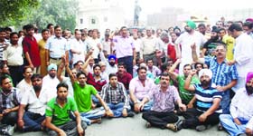 Traders hold a protest in Amritsar on Wednesday