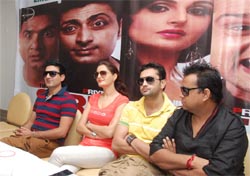 Actress Monica Bedi flanked by singers-turned-actors Preet Harpal (left) and Roshan Prince (right) during a press conference held to promote their upcoming Punjabi film, Sirphire, in Bathinda on Wednesday. Tribune photo: Pawan Sharma