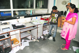 Employees of the sampark centre take a stock of the situation at their office in Hallo Majra on Wednesday.