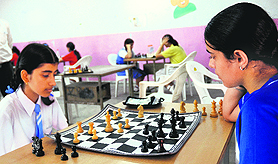 Students make moves in a chess match at Government Model School, Sector 38, Chandigarh, on Wednesday. Tribune photo: S Chandan