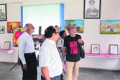 Aabid Surti ( in black t-shirt) visits RIMC in Dehradun on Wednesday.