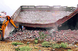 A shop razed during a demolition drive that ended abruptly at Fatehabad on Wednesday