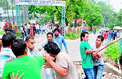 NSUI and ABVP activists clash outside the Government College in Dharamsala on Wednesday