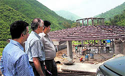 IIT Director Timothy A Gonsalves with CPWD engineers monitors the construction of ring-shaped dining hall at Kamand in Mandi