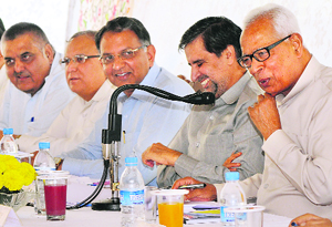 Governor NN Vohra chairs a post-Amarnath yatra meeting in Srinagar on Wednesday.