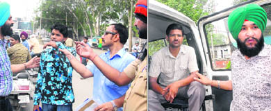 Health and police officials catch men for smoking in front of the DC office in Jalandhar on Wednesday. 