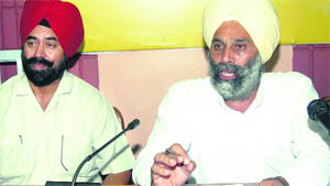 Harinder Pal Singh Kalsi addresses mediapersons in Jalandhar on Wednesday.