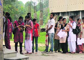 TIRESOME JOB: Students queue up for getting their application forms attested in Jammu University on Wednesday
