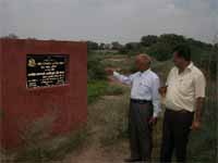 President of the PHD Chamber of Commerce and Industry, Bathinda, Raman Watts (right), at the site where possession of industrial plots have not been given. 