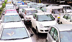 Traffic jam after rain at Madhya Marg .
