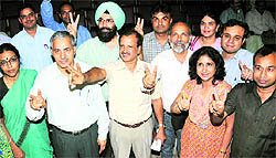 New president of PUTA Mohammad Khalid (centre) with other elected members at the law auditorium in Panjab University on Thursday
