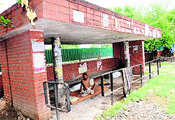 An old brick-structure bus queue shelter in Sector 45 is a home to a beggar. Commuters prefer to wait on the road to board a bus there