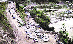 vehicles stranded in mud on a highway