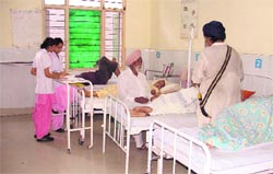 Student nurses attend to patients at Lord Mahavir Civil Hospital following a strike by staff nurses in Ludhiana on Thursday. Photo: inderjeet verma