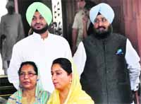 SAD MP Harsimrat Kaur (R) with Paramjeet Kaur Gulshan and Congress MPs Partap Singh Bajwa and Ravneet Singh Bittu (L) at Parliament House in New Delhi on Thursday.