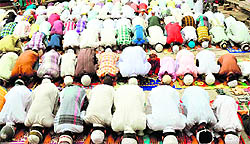 Muslim devotees offer Jumma namaaz on the third Friday of Mah-e-Ramzaan at Jwalapur in Haridwar