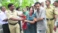 The grief-stricken mother of the girl who was allegedly killed by a stalker on the GJU campus in Hisar on Friday. A Tribune photograph