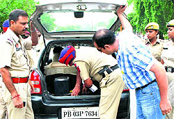 Police checking cars during the bandh in Patiala on Friday