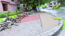 Sand being used to fix tiles in Sector 21, Chandigarh. 