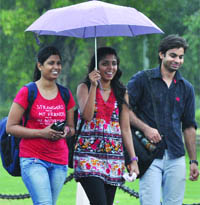 The rains on Saturday brought cheer to these youngsters who were seen strolling at the Rajpath.