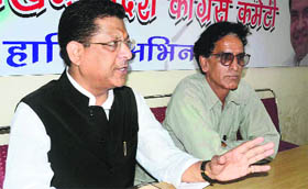 Congress vice-president Suryakant Dhasmana addresses a press conference in Dehradun on Saturday.