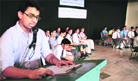 A participant in the inter-school English debate competition held at Summer Valley School in Dehradun on Saturday.