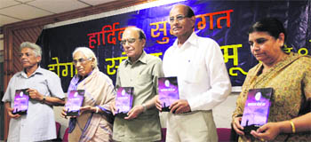 Members of the Dogri Sanstha release veteran Dogri writer late Bal Krishan Bhauras book, Chaanan Cheten Da, at KL Sehgal Hall in Jammu on Saturday. 