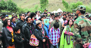 An Army officer briefs tourists about the Kargil War during the recent Vijay Divas celebrations at Drass. 