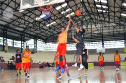 Players vie for the ball during the Mahindra NBA Challenge Basketball League in Ludhiana on Saturday. Photo: Inderjeet Verma