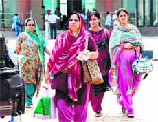 Pakistani Hindu pilgrims arrive at the Attari border checkpost on Saturday. 