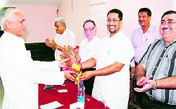 Small-scale industrialists welcome Industry Minister Anil Joshi at a meeting in Amritsar