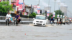 Showers inundated the Bathinda-Goniana road much to the inconvenience of motorists on Sunday
