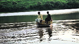 Divers look for the bodies of the victims who drowned in Tikar Taal, Morni, on Sunday.