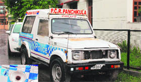 An abandoned police control room vehicle and its uncovered petrol filling point (inset) outside Ruchikas house in Sector 12, Panchkula.