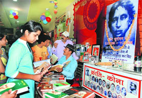 Children listen to Jagjit Bhagat Singh (wearing hat) at Kraanti Kona in Panchkula on Sunday.