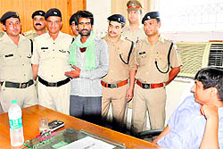 Accused Prem being interrogated by Haridwar SSP Arun Mohan Joshi in Haridwar on Sunday