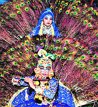Artistes dressed as Radha and Krishna during the celebrations of Janmashtami at Siddhpeeth ashram in Haridwar