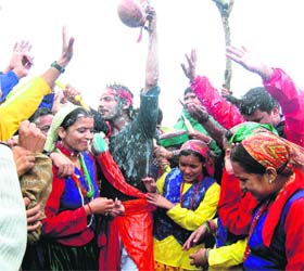 People participate in the Hill Jatra festival in Pithoragarh