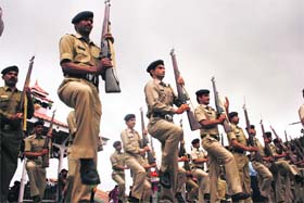 Policemen march during a rehearsal for the Independence Day parade in Shimla on Sunday
