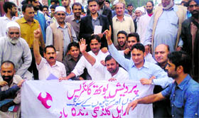 State Youth Congress leaders hold a protest outside the DCs office in Kupwara on Sunday.