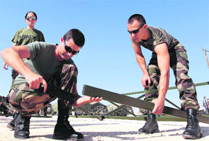French military medics set up tents at the Zaatari camp for Syrian refugees in Jordian city of Mafraq.