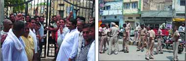 Protesters (left) lock the Abohar Municipal Council complex on Monday; the police was summoned to avert clash between the protesters and the Abohar MC