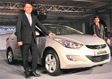 Hyundai Motor India MD & CEO B.S. Seo with VP (sales) Rakesh Srivastava at the launch of the Neo Fludic Elantra on Monday.