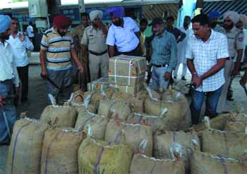 Security personnel carry out checking at the railway station on Monday ahead of the Independence Day.