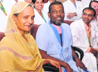 Bangladesh national Abdul Mannan with his wife at a press conference in Mohali on Monday. tribune photo: vicky gharu